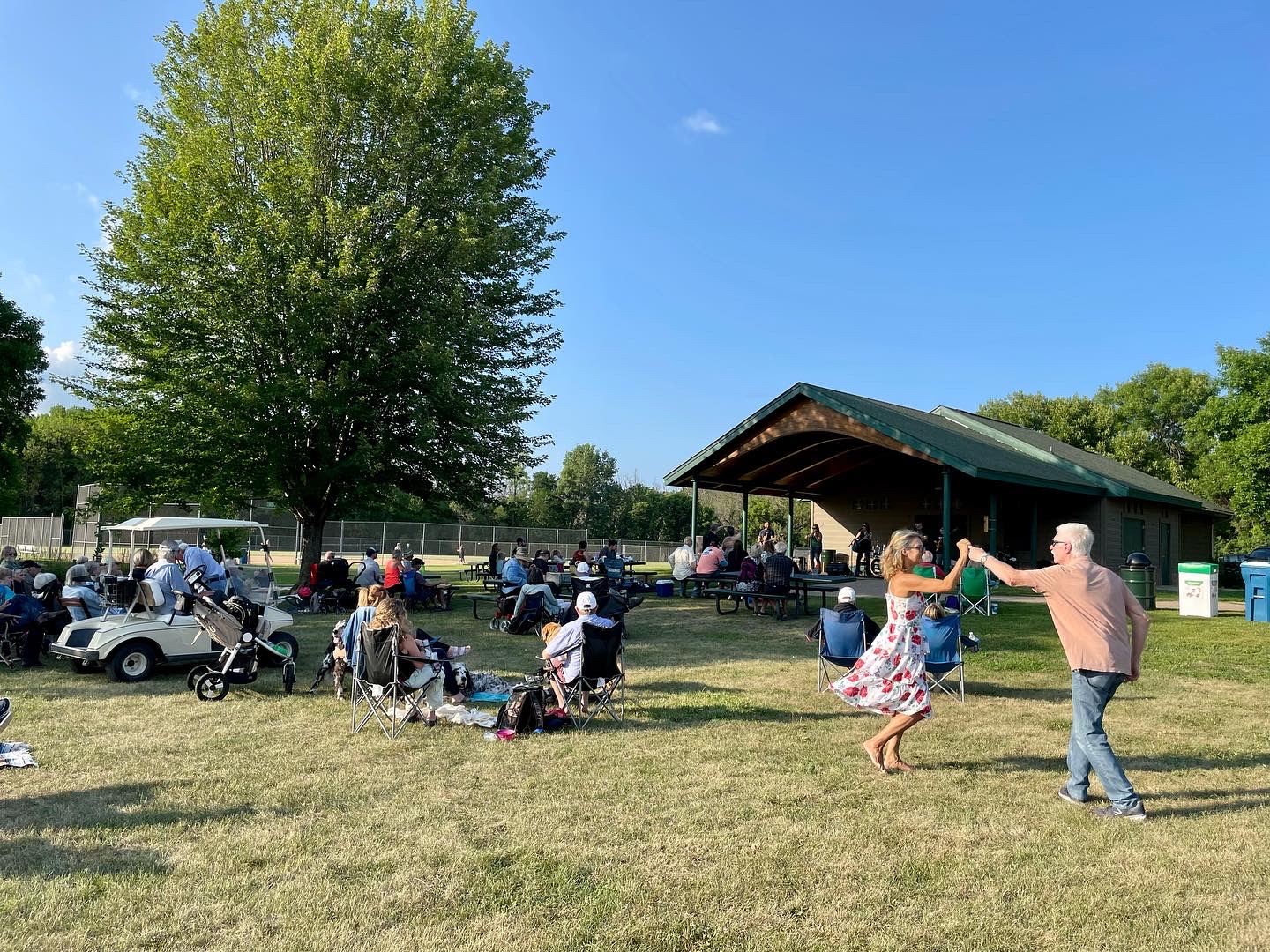 people dancing in park 